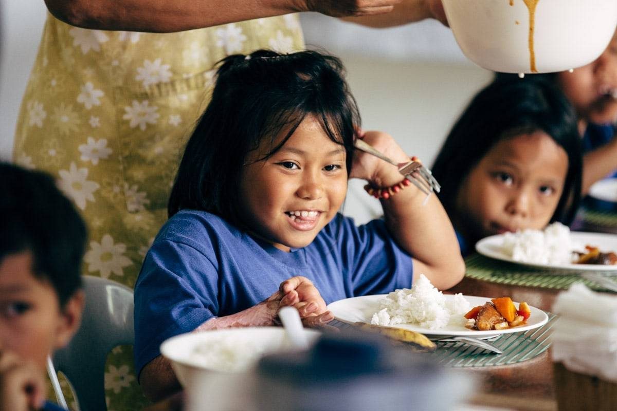 Children eating at a table.