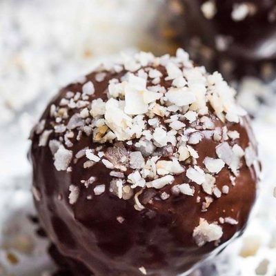 Dark Chocolate Coconut Bites with coconut sprinkled on.