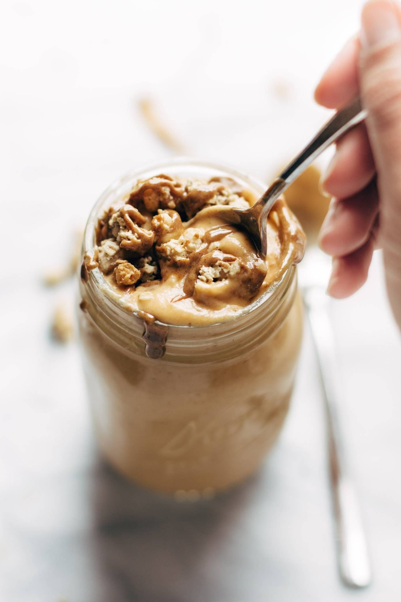 Autumn Glow Milkshake in a jar with a spoon