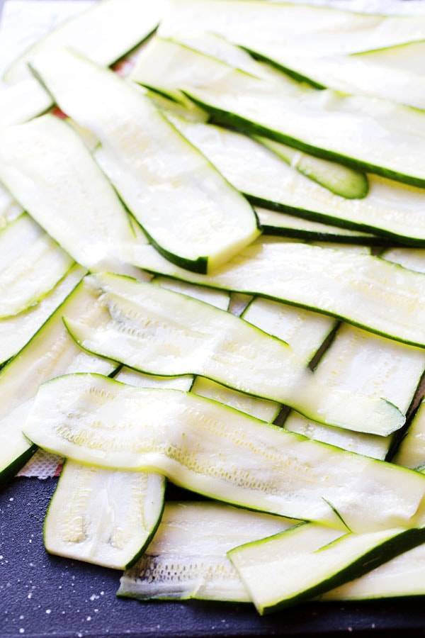 Thin slices on zucchini.