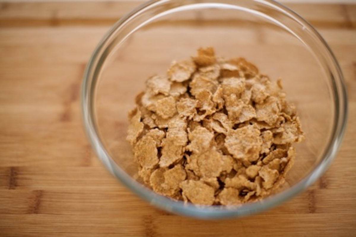 Cereal in a glass mixing bowl.
